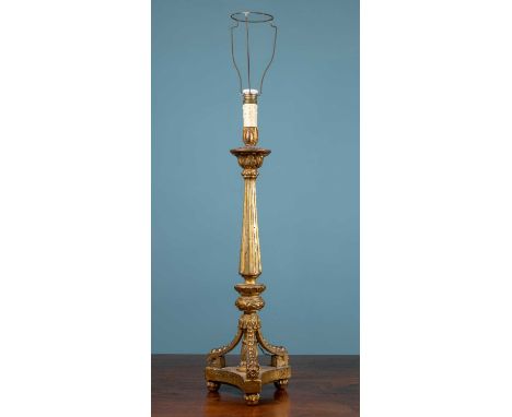 An antique carved giltwood Italian table lamp with fluted column and triform base78cm high to the fittingQty: 1Some losses, m