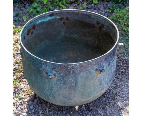 An old copper kettle drum body, later converted for use as a garden planter62cm diameter x 44cm highQty: 1In weathered condit