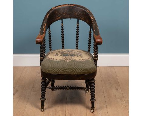 An antique Scandinavian desk chair with painted decoration overall, bobbin-turned supports to the aching back and further bob