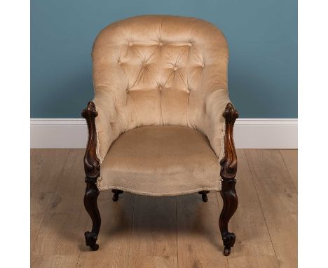 A 19th century mahogany button-back armchair, with mushroom upholstery and on brass castors61cm wide x 78cm deep x 80cm highQ