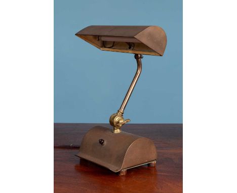 A mid 20th century lacquered brass articulated desk lampthe shade 25cm wide,&nbsp; the lamp approximately 35cm high (adjustab