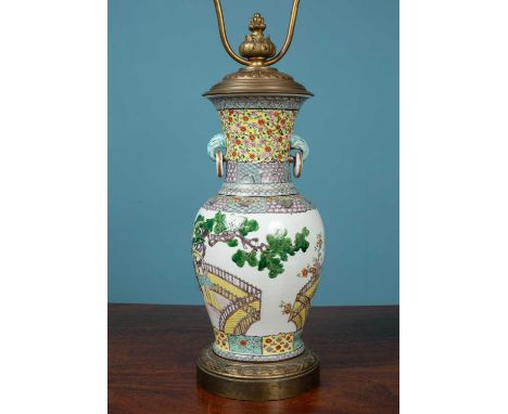 A Chinese porcelain famille verte vase later converted for use as a table lamp with cast metal mountsthe vase 37cm high,&nbsp