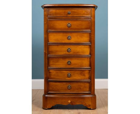 A Brigitte Forester cherrywood narrow chest of seven drawers with ring handles68cm wide x 42cm deep x 126cm highQty: 1Minor m