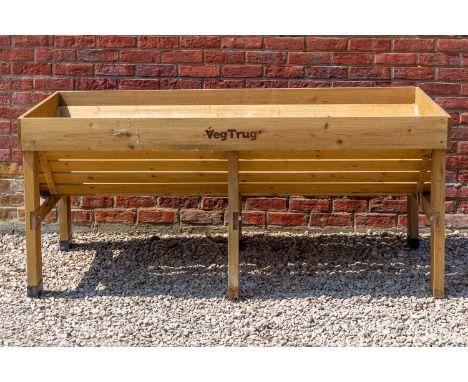 A modern wooden V-section planter180cm wde x 75cm deep x 80cm highQty: 1In good, almost unused condition. With some slight we
