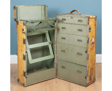 An early 20th century 'Watajoy', vellum covered cabin or steamer trunk with fitted interiorOxidisation to the chrome mounts. 