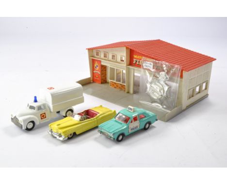 Matchbox plastic garage plus Dinky Duo comprising Ford Escort Police Car and Cadillac Eldorado. In addition, Vilmer Ambulance