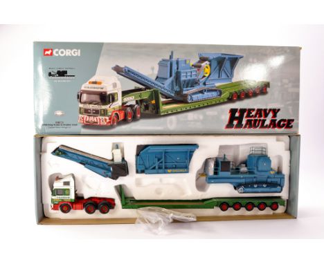Corgi Diecast Model Truck issue comprising No. 12002 MAN King Trailer and Crusher Load in the livery of Cadzow Heavy Haulage.