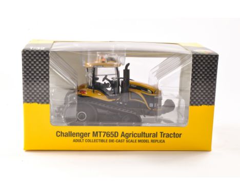 USK Scale Models 1/32 Farm Model issue comprising Challenger MT765D Tractor. Excellent and secured in Box. 