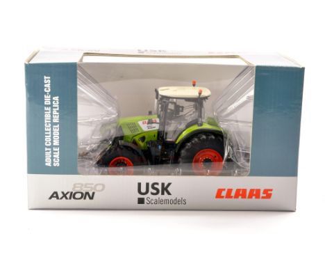 USK Scale Models 1/32 Farm Model issue comprising Claas Axion 850 Tractor. Excellent and secured in Box. 