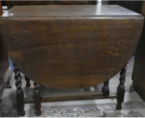 An Oak Drop Leaf Barley Twist Gate Legged Dining Table with Oval Top, 89cm Wide 