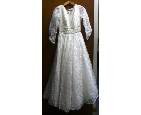 A Vintage Lace and Embroidered Wedding Dress 