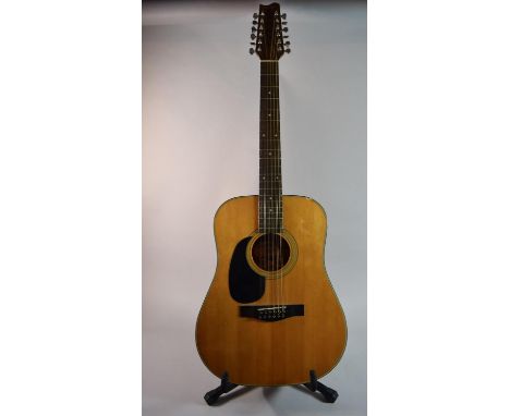 A Vintage 1980s Fender Left Handed 12 String Acoustic Guitar with Hard Shell Case. Model Number F310-12 