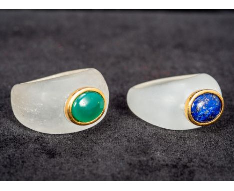 A lapis lazuli and gold set ringTogether with a similar jade set ring.  The former 1.2 cm high. (2) CONDITION REPORTS: Some c