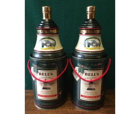 Bell's Extra Special Scotch WhiskyIn fine porcelain decanter, Christmas 1990, two bottles, both in original boxes.  (2) CONDI