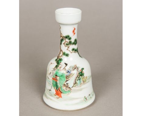 A Chinese porcelain vaseOf mallet form, worked with a figure and a crane before a pine tree, blue painted six character Kangx