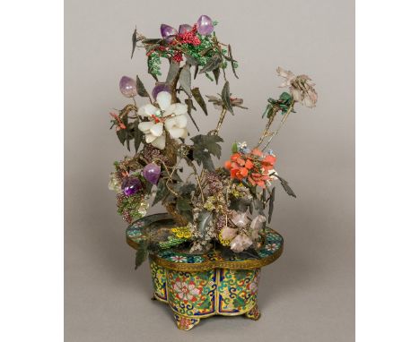 A Chinese specimen stone set model bonsai treeMounted in a lobed cloisonne pot, the underside with six character seal mark.  