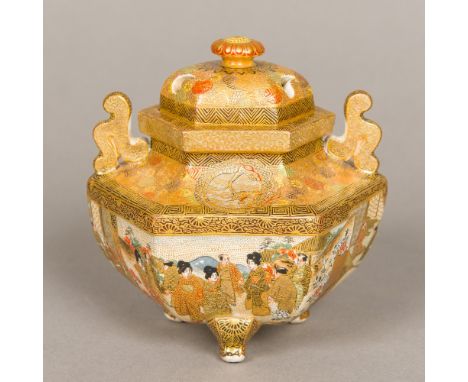 A 19th century Japanese Satsuma koroOf hexagonal form, with pierced removable lid above the scrolling twin handles, decorated