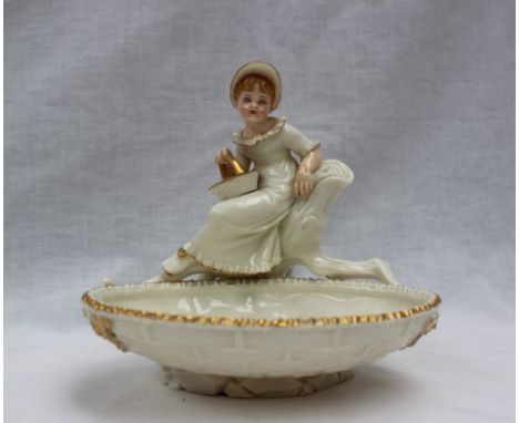 A Royal Worcester bon bon dish, with a basket in the foreground and young girl above, green printed mark, impressed mark 776,