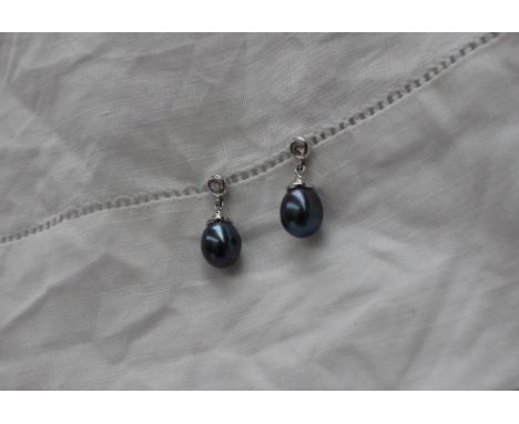 A pair of black pearl and diamond drop earrings, to an 18ct white gold setting and post