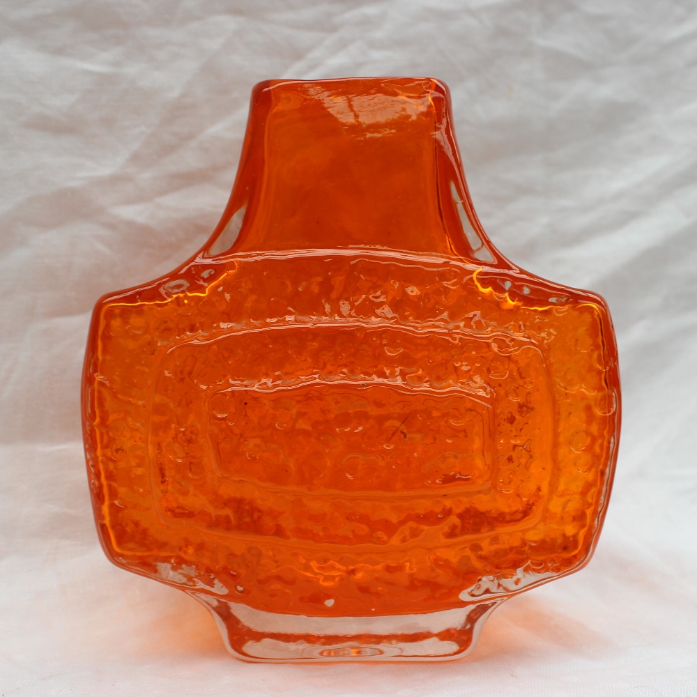 A Whitefriars glass TV vase, designed by Geoffrey Baxter, in tangerine