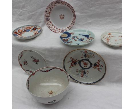 An oriental porcelain shallow dish decorated with flowers and leaves, 16cm diameter, a saucer dish decorated with landscape s