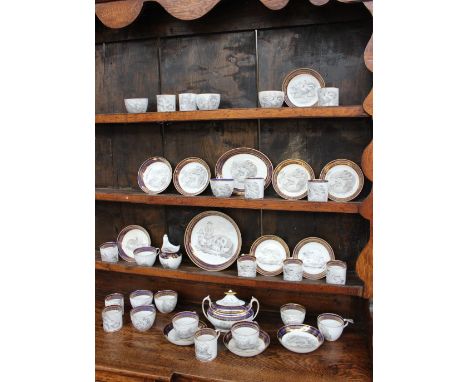 An early 19th century English porcelain part tea service, black and white bat printed with various scenes including Stags, de