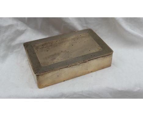 An Elizabeth II silver cigarette case of rectangular form, with an engine turned edge, Birmingham, 1958, E & N Speak, 13.5 x 