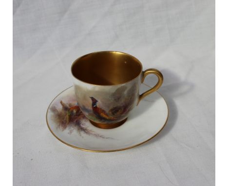 A Royal Worcester Cabinet cup and saucer, painted with pheasants, signed James Stinton, puce mark and date code for 1913  CON