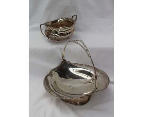A George V silver twin handled sugar basin, Birmingham, 1945, Alexander Clark & Co Ltd, together with a silver swing handled 