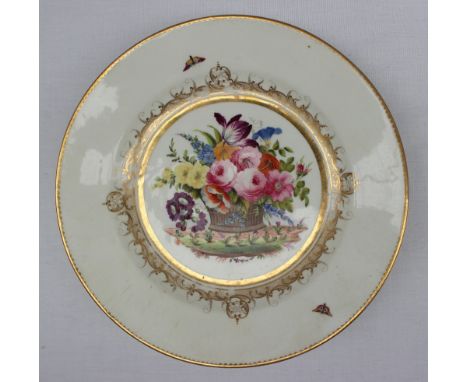 A Swansea porcelain plate from the Burdett-Coutts service, possibly painted by James Turner, with a basket of flowers surroun