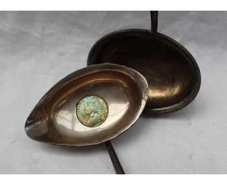 A white metal toddy ladle, with a turned wooden handle together with another ladle bowl inset with a George II coin dated 174