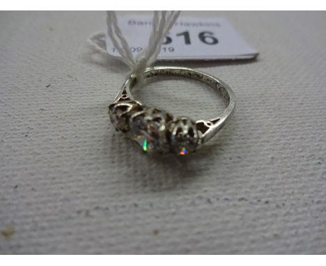 SILVER RING WITH 3 WHITE STONES MARKED SILVER