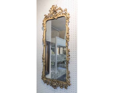 PIER GLASS, of compact proportions, 19th century gilt frame with foliate detail enclosing the original plate, 95cm H x 36cm W