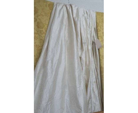 CURTAINS, a pair, ivory silk, each lined 95cm W x 220cm drop. (2)