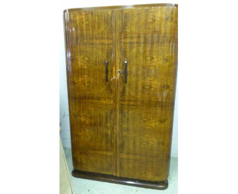 WARDROBE, Art Deco burr walnut, with pair of 'ripple' fronted doors enclosing light maple lined interior hanging space, 194cm