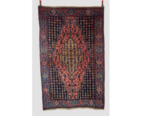 Bijar rug of Mazlaghan design, north west Persia, circa 1950s, 6ft. 9in. X 4ft. 4in. 2.05m. X 1.32m. Light red 'lightning' ed