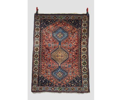 Two south Persian rugs, the first, Fars, south west Persia, mid-20th century, 4ft. 10in. X 3ft. 5in. 1.47m. X 1.04m. Slight l