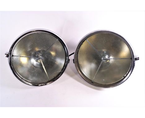 A pair of chrome finish Lucas car headlights, 31cm diameter