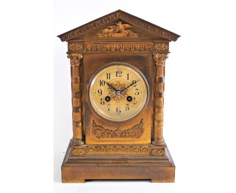 A French mid 19th century gilt metal mantel clock, of classical architectural form, the movement striking on a bell, stamped 