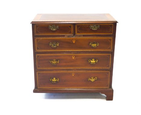An Edwardian mahogany and satinwood cross banded and marquetry chest of two short and three long drawers, on three bracket fe