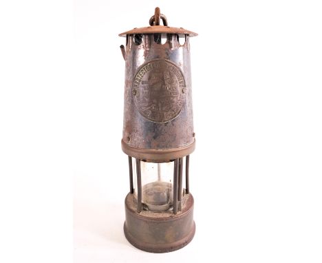 A miners lamp, in brass and other metals, type SL by Protector Lamp Lighting of Eccles, 24cm high