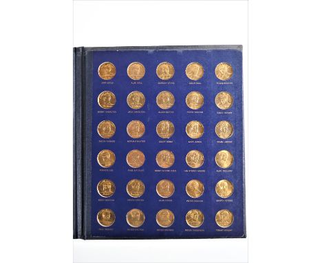 The Franklin Mint 1970 England World Cup coin collection from Esso, in a blue Folio, 9cm x 24cm