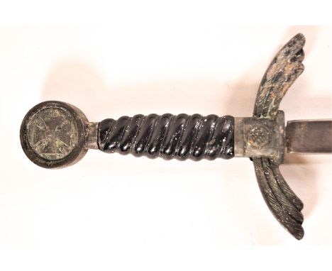 An old German service sword in scabbard, the handle decorated with associated symbols 96 cm