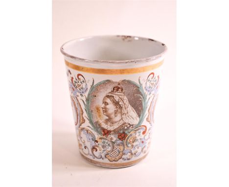 An 1897 enamel tin beaker, polychrome transfer decorated with a scene of Windsor Castle, and a portrait of Queen Victoria for