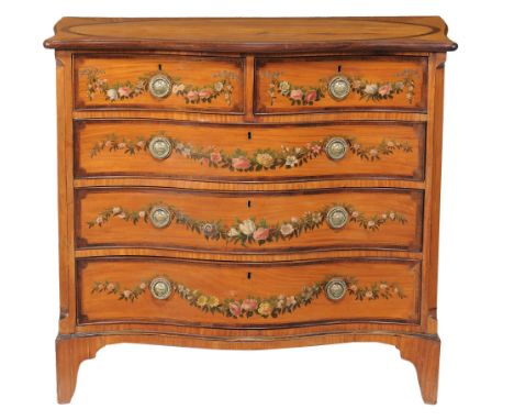A Victorian satinwood and painted serpentine chest of drawers, circa 1860  A Victorian satinwood and painted serpentine chest