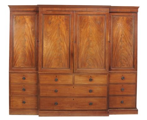 A late George III mahogany breakfront compactum linen press , circa 1800  A late George III mahogany breakfront compactum lin