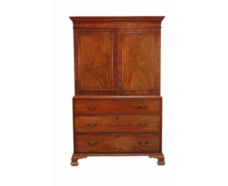 A late George III mahogany linen press , circa 1800  A late George III mahogany linen press  , circa 1800, the moulded cornic