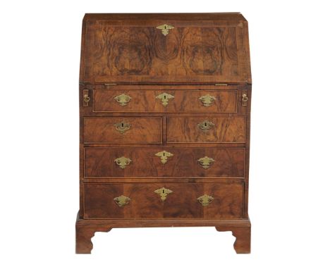 A burr walnut bureau, circa 1740 and later  A burr walnut bureau, circa 1740 and later  , the hinged fall enclosing a fitted 