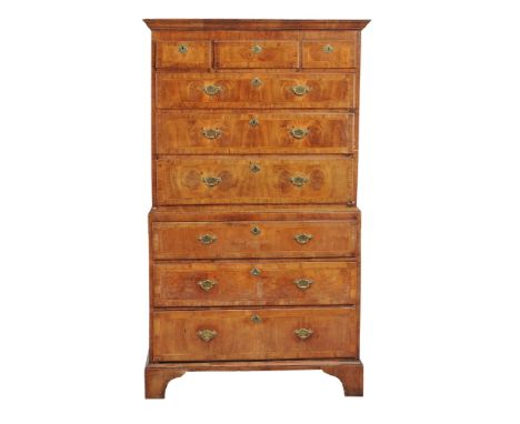 A George II walnut chest on chest, circa 1735  A George II walnut chest on chest, circa 1735  , the moulded cornice above thr