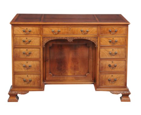 A mahogany kneehole desk in the manner of Chippendale , 20th century  A mahogany kneehole desk in the manner of Chippendale  